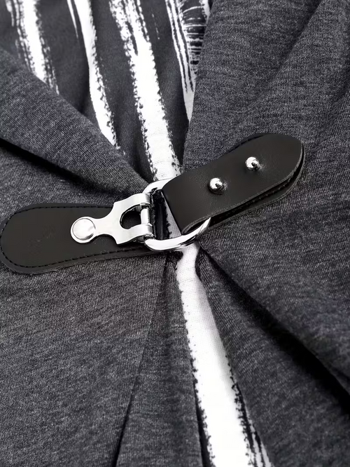 A Long-Sleeved Women'S Top Designed to Look Like Two Pieces